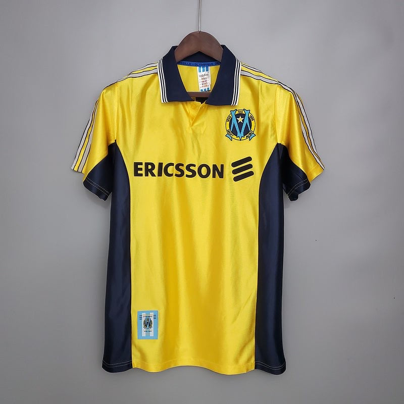 Maillot Olympique de Marseille extérieur rétro 1998-1999, marque Le 12-ème Maillot, vue front avec logo et détails vintage