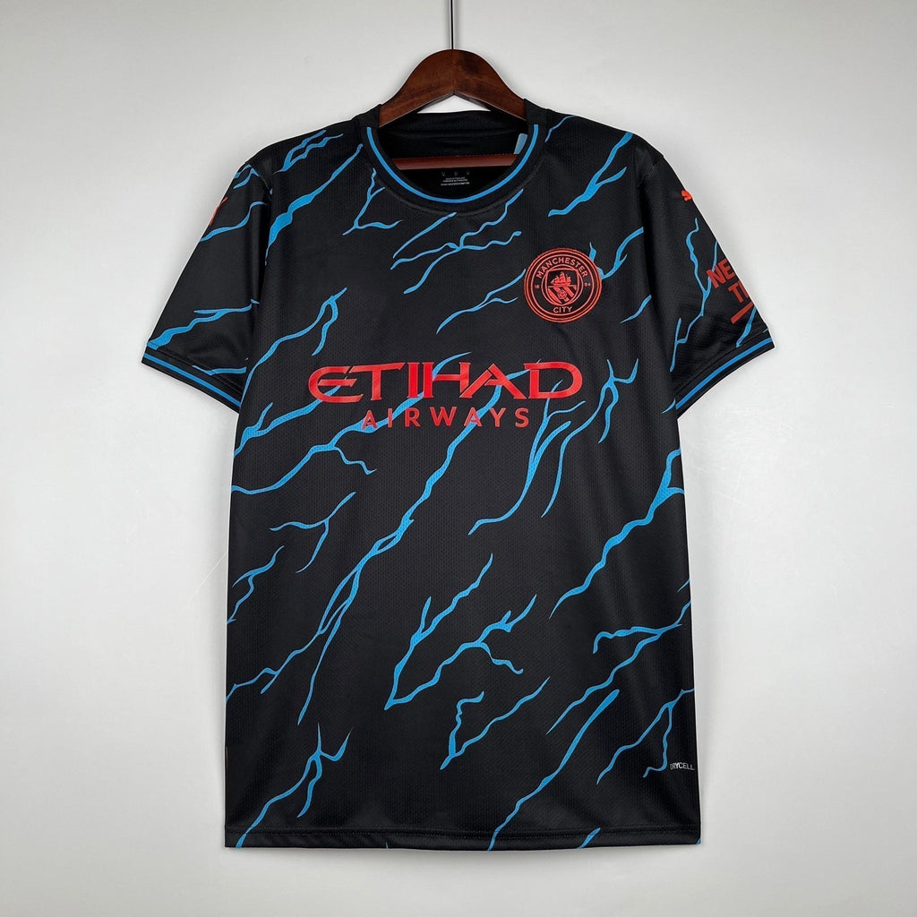 Maillot spécial Manchester City 2023-2024 Le 12-ème, devant avec logo et design unique, vue de face.