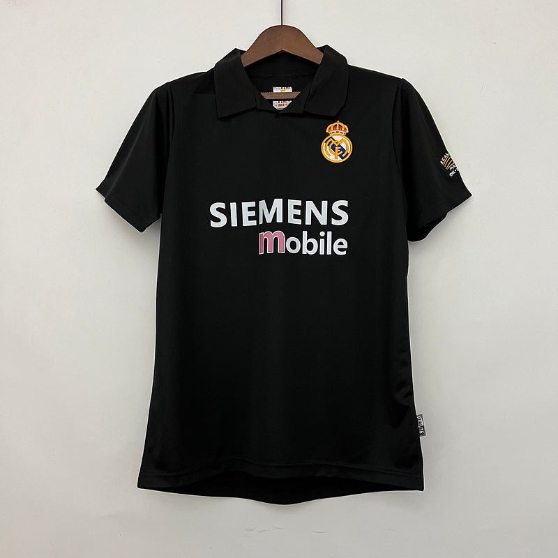 Maillot rétro Real Madrid 2002-2003 de la marque Le 12-ème, vue de face avec logo et détails du maillot.
