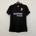 Maillot rétro Real Madrid 2002-2003 de la marque Le 12-ème, vue de face avec logo et détails du maillot.