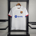 Maillot extérieur FC Barcelone 2023-2024 Le 12, maillot de football avec logo et design moderne, vue de face.