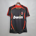 Maillot rétro third de l'AC Milan 2006, signé Le 12-ème Maillot, avec logo et détails du design vintage.