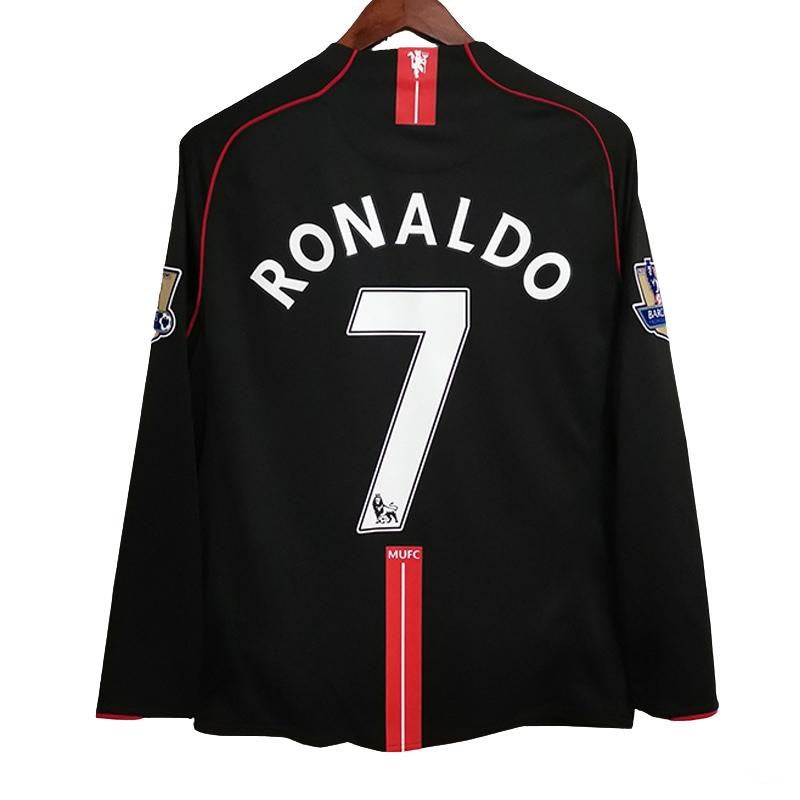 Maillot extérieur rétro Manchester United Manches Longues 2007-2008, marque Le 12-ème Maillot, vue de face avec logo et détails.