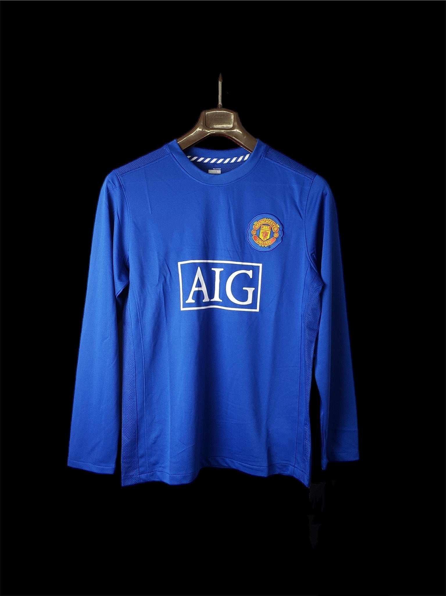 Maillot third rétro Manchester United à manches longues 2007-2008, marque Le 12-ème Maillot, vue de face.