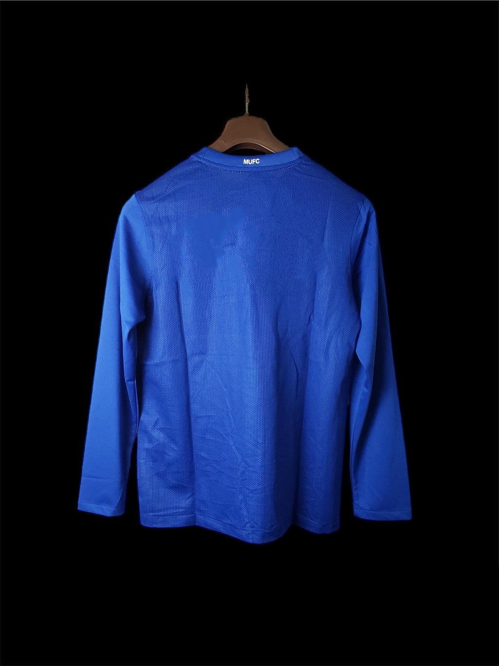 Maillot third rétro Manchester United à manches longues 2007-2008, marque Le 12-ème Maillot, vue de face avec logo et détails du design.
