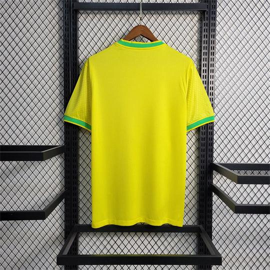 Maillot 24/25 Édition Spéciale Oiseau Jaune du Brésil, maillot de football Le 12, vue de face avec logo et détails colorés