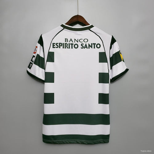 Maillot de sport 2001-2003 édition limitée Le 12 -ème Maillot, coloris et design visibles, tissu technique et logo sur le devant.