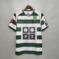 Maillot de sport édition limitée 2001-2003 Le 12 -ème Maillot, vue de face, tissu coloré avec logo et détails de design.