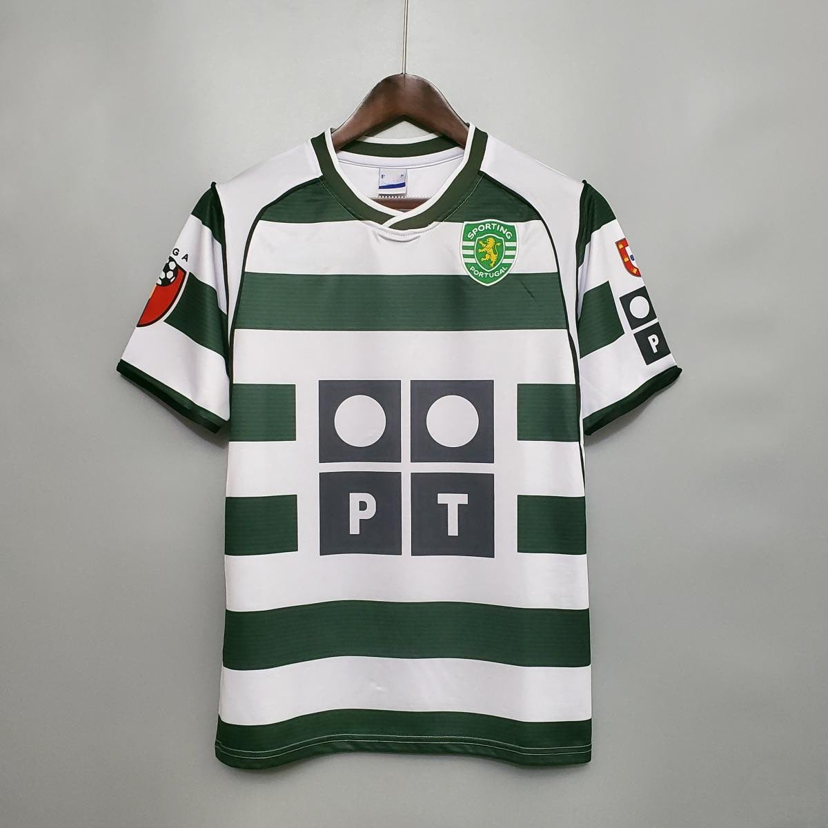 Maillot de sport édition limitée 2001-2003 Le 12 -ème Maillot, vue de face, tissu coloré avec logo et détails de design.