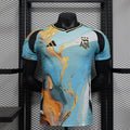Maillot Concept Argentine 2024/25 de Le 12 -ème, jersey de football bleu avec détails jaunes et logo officiel.