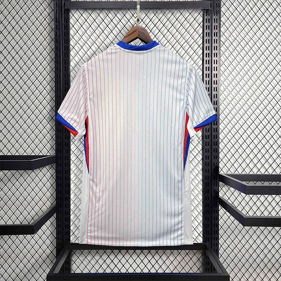 Maillot extérieur de l'équipe de France de football 2024-2025, marque Le 12, affichant les couleurs et le logo de l'équipe nationale.