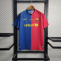 Maillot rétro de football FC Barcelone saison 2008-2009, marque Le 12-ème Maillot, vue de face avec logo et couleurs emblématiques.