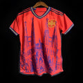 Maillot domicile de l'Espagne 2024/25 Le 12, maillot de football rouge avec logo officiel et détails du design.