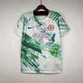 Maillot Nigeria Concept 2024 de Le 12, maillot de football avec drapeau nigérian et design moderne, vue de face.