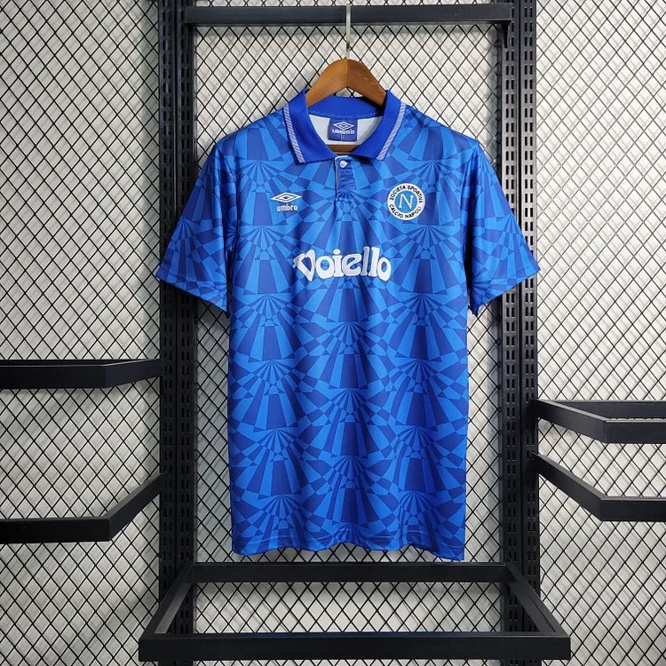 Maillot rétro Le 12 Naples 1991/93, maillot de football vintage, en tissu bleu avec logo et détails de l'époque.