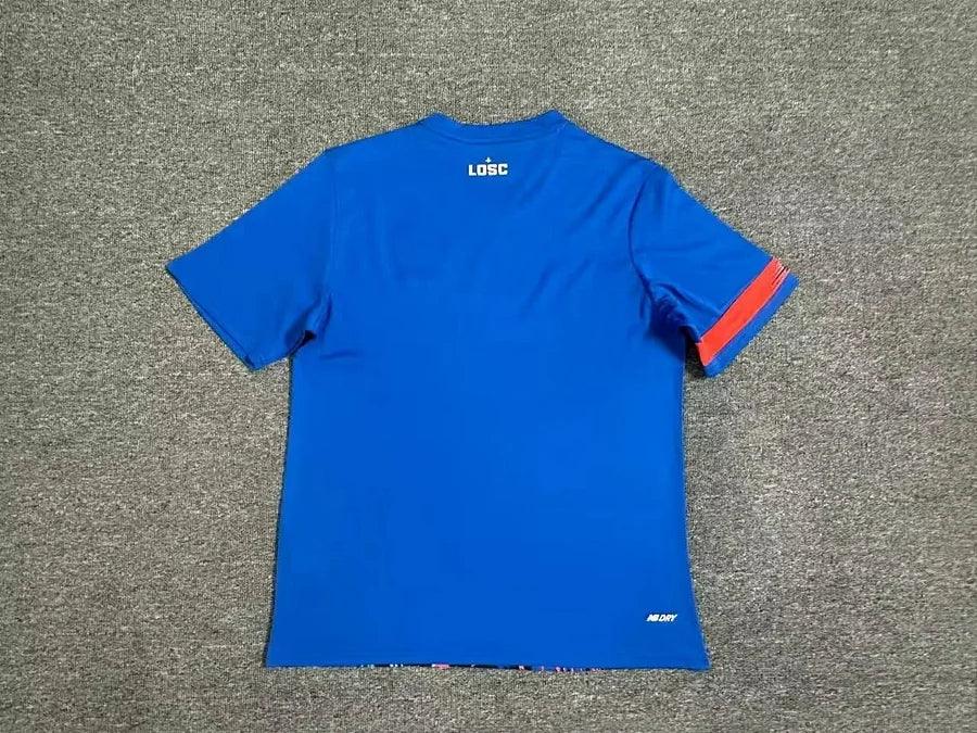 Maillot Lille 2023/24 Third de Le 12 -ème Maillot, vue de face, avec logo et design distinctif en bleu et blanc.