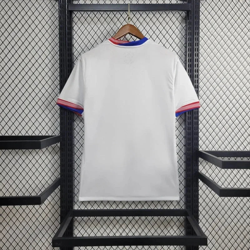 Maillot États-Unis 2024/25 Le 12, maillot de football américain avec logo et design officiel, vue de face.