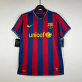 Maillot rétro FC Barcelone 2009/10 Le 12, maillot de football vintage avec logo et design classique, vue frontale.