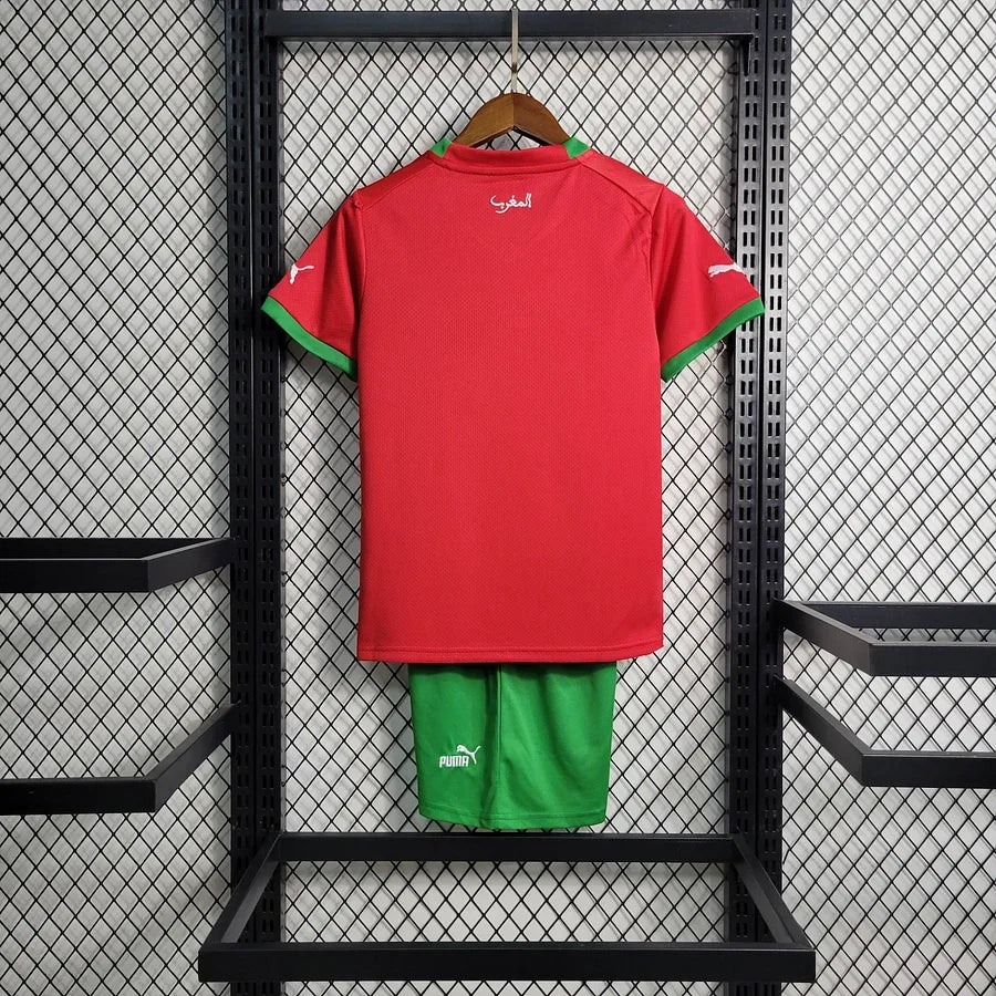 Maillot enfant Maroc 2022 Le 12 -ème Maillot, vue de face avec logo et détails colorés sur le tissu.