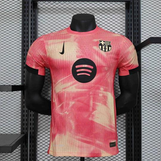 Maillot 24-25 Édition Spéciale Rose FC Barcelone Le 12, devant du maillot avec logo et détails roses.
