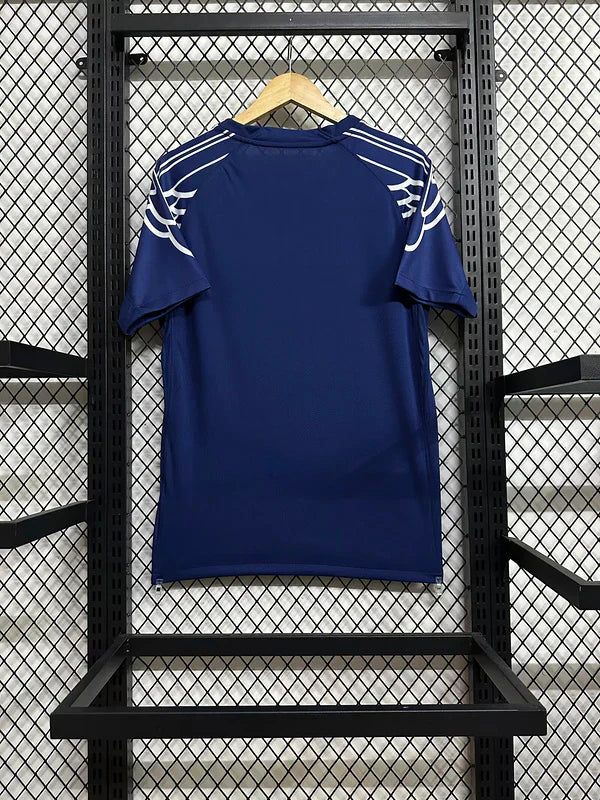 Maillot PSG 24/25 bleu Le 12 -ème Maillot, manches courtes, logo du PSG et détails en blanc, vue frontale.