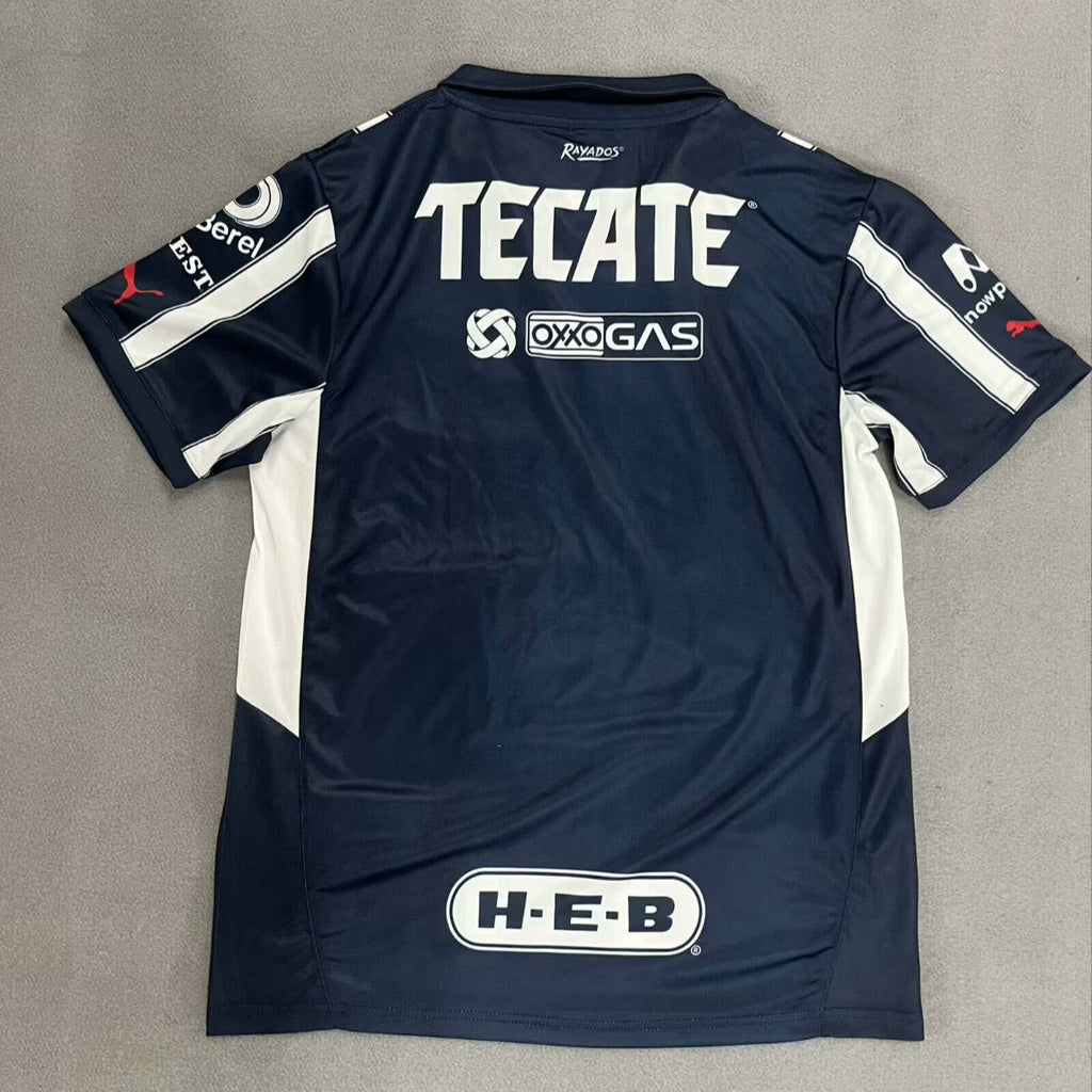 Maillot de football Monterrey 24/25, marque Le 12-ème, vue du maillot avec logo et détails en bleu et blanc.