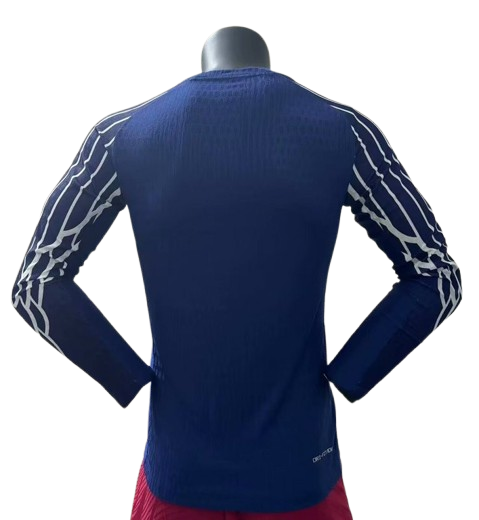 Maillot de football PSG bleu manches longues Le 12 -ème Maillot, modèle Player 25/26, vue front avec logo et détails.