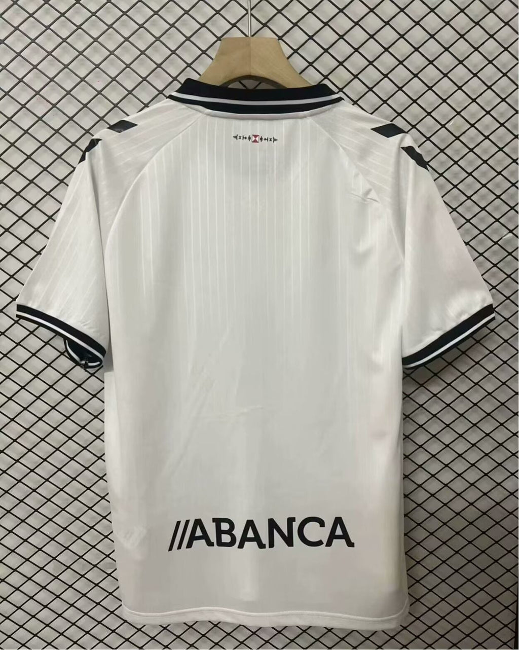 Maillot blanc Celta Vigo 25/26 de Le 12, maillot de football pour fans, avec logo de l'équipe visible.