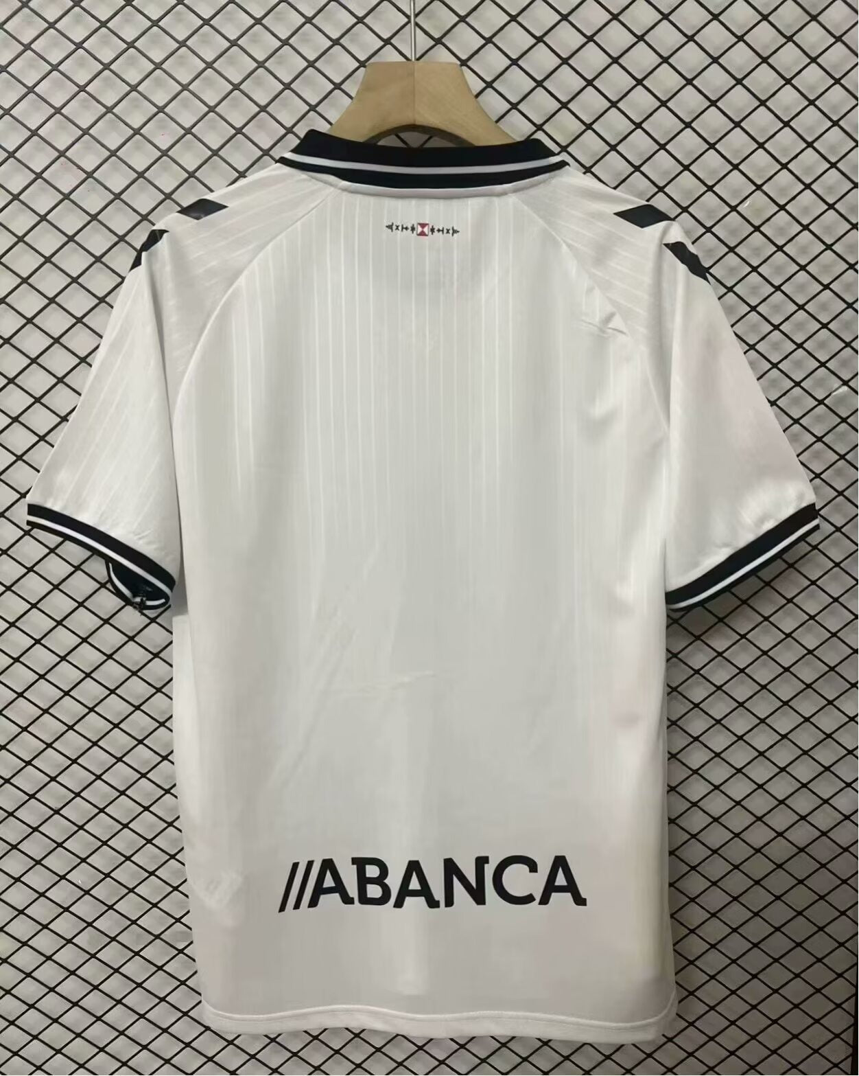 Maillot blanc Celta Vigo 25/26 de Le 12, maillot de football pour fans, avec logo de l'équipe visible.