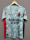 Maillot de football AC Milan 25/26, marque Le 12 -ème Maillot, en tissu rouge avec logo et détails blancs.