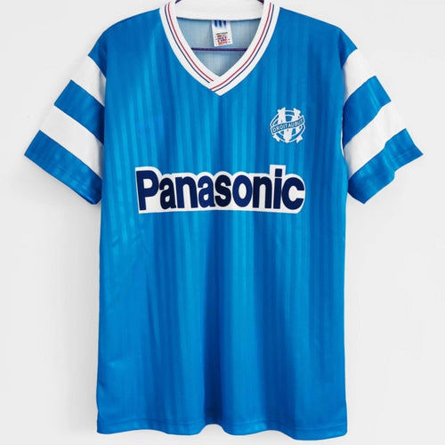Maillot rétro extérieur 1990 Marseille Le 12 -ème Maillot, maillot de football vintage avec logo et détails colorés.