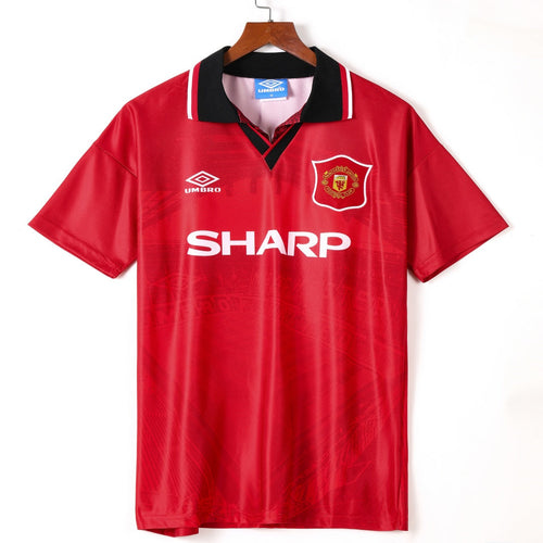 Maillot domicile Manchester United rétro 1994-1996, marque Le 12-ème Maillot, vue de face avec logo et détails traditionnels