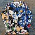 Maillot Manchester United 25/26 à manches longues, modèle spécial A, marque Le 12ème Maillot, vu en détail.