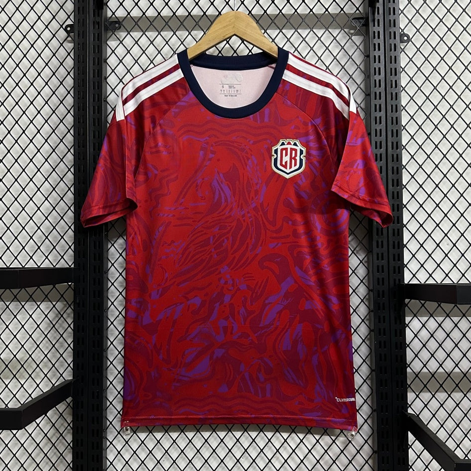 Maillot domicile Costa Rica 25/26 de Le 12 -ème Maillot, maillot de football avec couleurs rouges et bleues, détails du logo.
