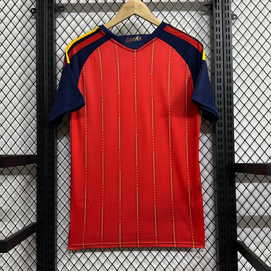 Maillot domicile de l'équipe d'Espagne 25/26, marque Le 12 -ème Maillot, vue de face avec logo et détails du maillot.