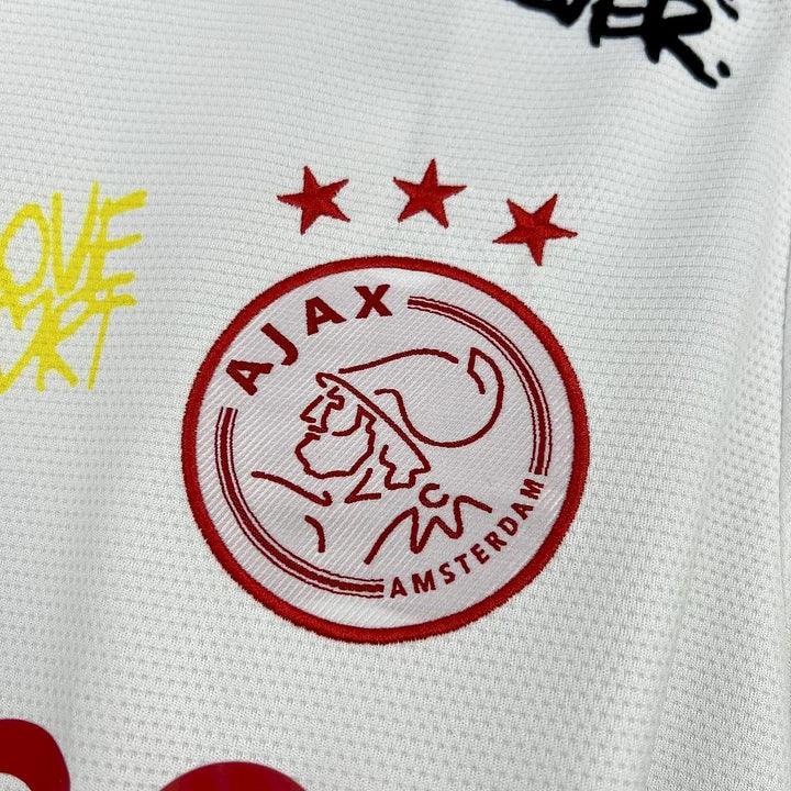 Maillot de football Ajax Amsterdam Bob Marley Le 12 -ème Maillot 2025 2026, maillot officiel avec logo et design coloré.