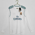 Maillot rétro domicile Real Madrid 2017-2018, manches longues, marque Le 12 -ème Maillot, drapeau et logo du club visible.