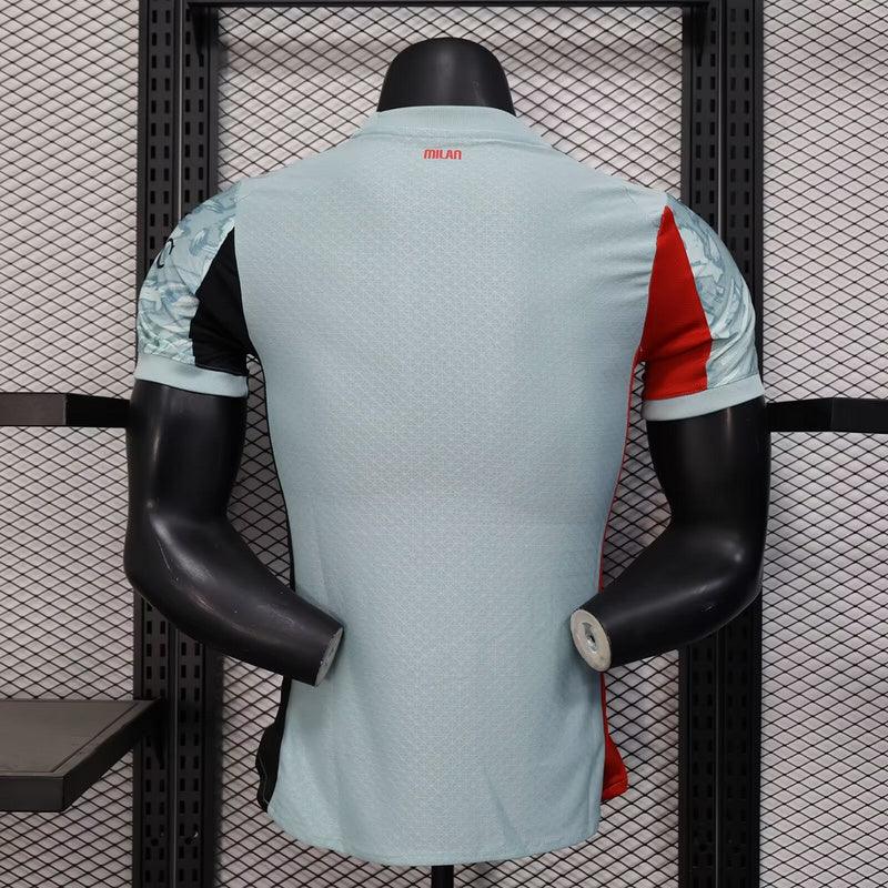 Maillot de football AC Milan 25-26 ans, marque Le 12 -ème Maillot, en tissu respirant avec logo et sponsor visibles.