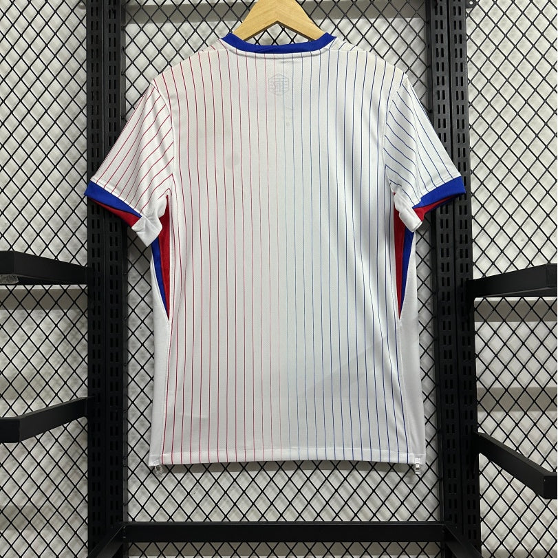 Maillot extérieur de l'équipe de France 2023-2024, marque Le 12 -ème Maillot, avec design bleu et logos officiels.