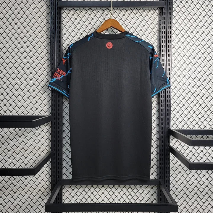 Maillot Manchester City saison 2023-2024 édition spéciale par Le 12-ème Maillot, maillot de football avec logo et design unique.