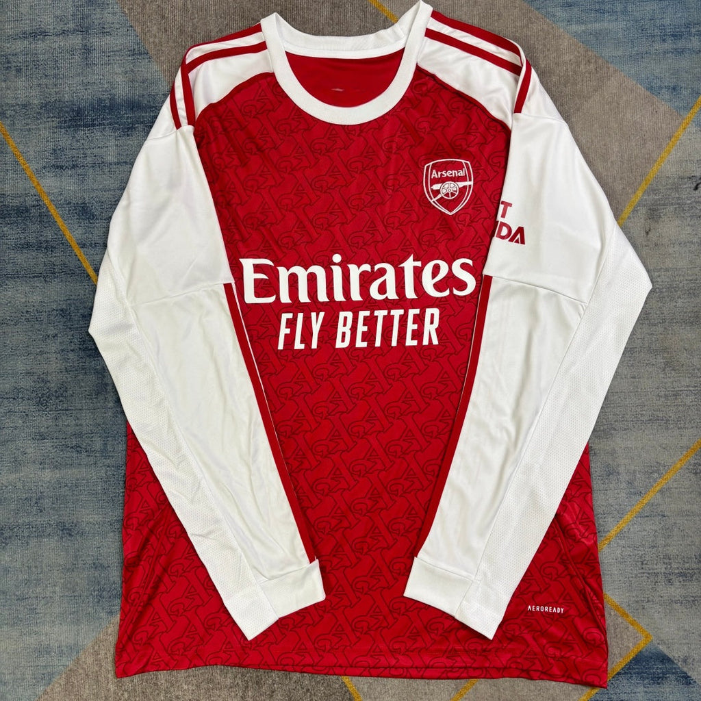Maillot domicile Arsenal 25/26 à manches longues, marque Le 12 -ème Maillot, en bleu avec logo et détails officiels.