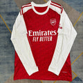 Maillot domicile Arsenal 25/26 à manches longues, marque Le 12 -ème Maillot, en bleu avec logo et détails officiels.