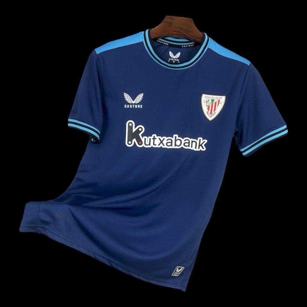 Maillot extérieur Athletic Bilbao 25/26, marque Le 12 -ème, en tissu sportif avec logo de l'équipe, vue de face.
