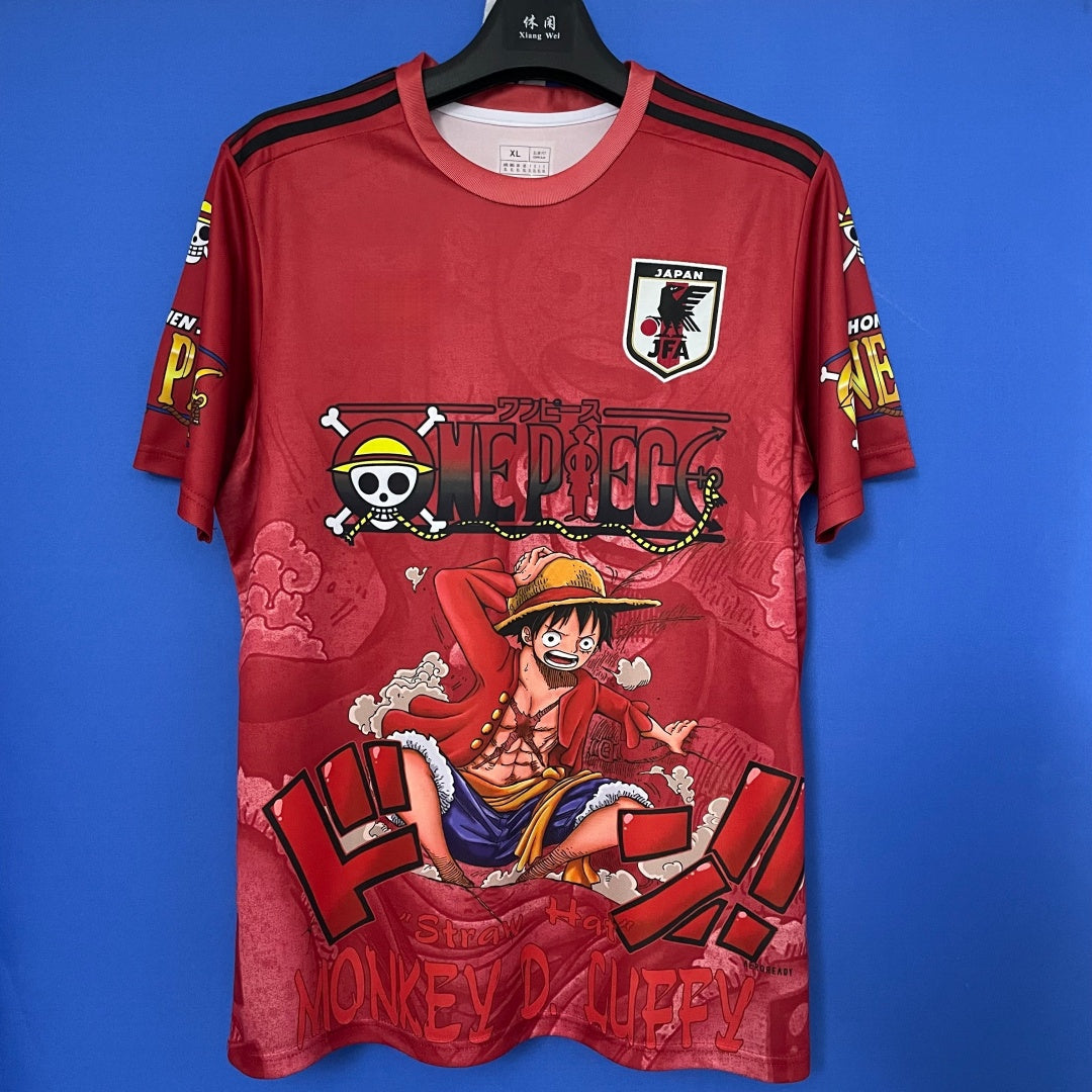 Maillot japonais anime rouge 25/26 Le 12 -ème Maillot, illustration spéciale en tissu léger, détails visibles.