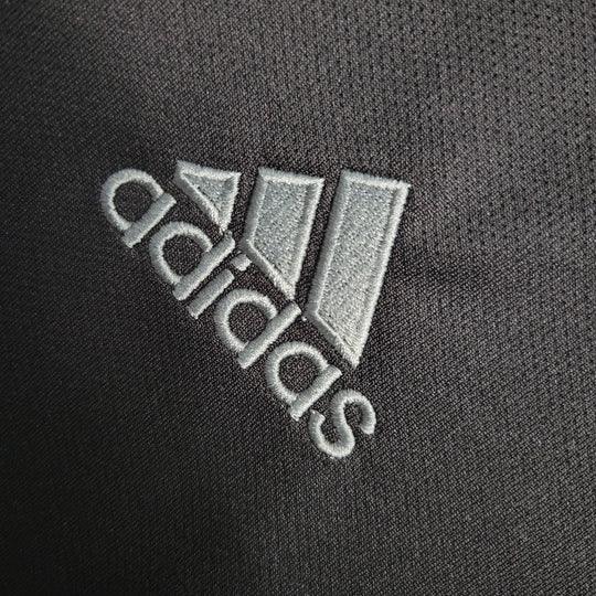 Maillot de football Arsenal 2023 2024 noir, fabriqué par Le 12 -ème Maillot, avec logo et détails du club visible.