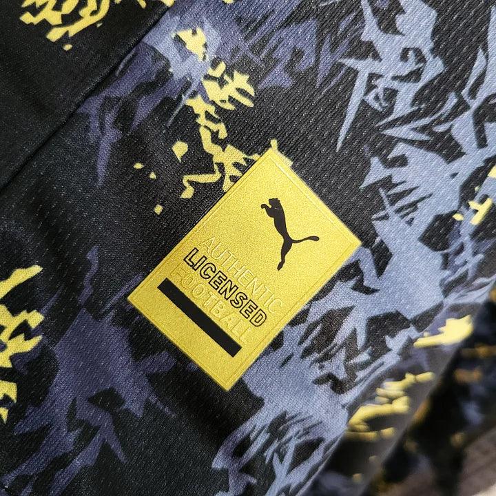 Maillot Manchester City 2023-2024 édition spéciale, marque Le 12, vue de face avec logo et détails du design.