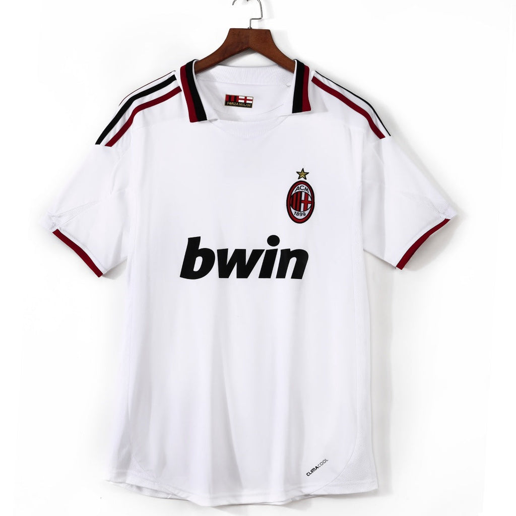 Maillot rétro extérieur de l'AC Milan 2009-2010, marque Le 12-ème Maillot, maillot de football en tissu rouge et noir.