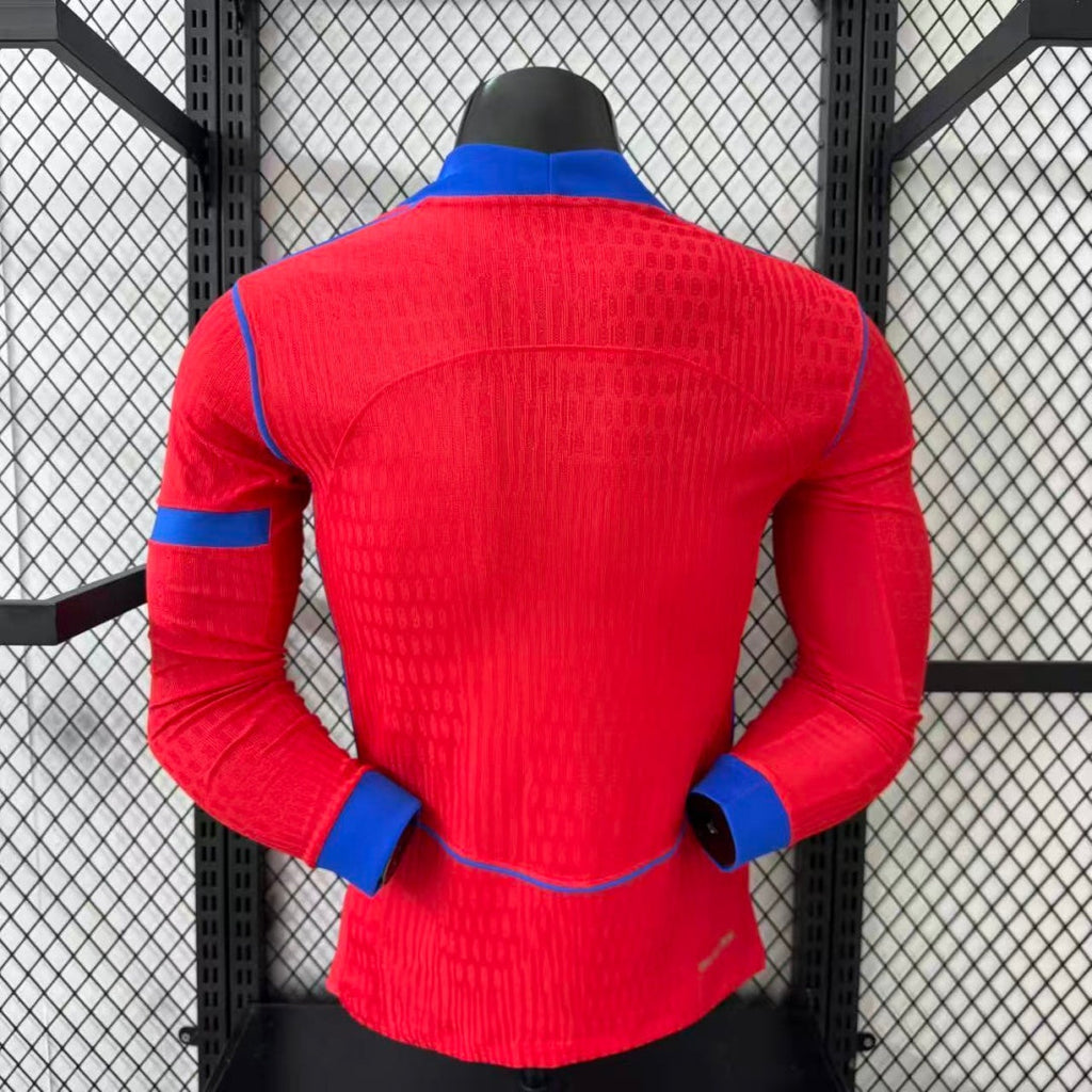 Maillot PSG 25/26 Le 12 -ème Maillot, maillot third à manches longues pour joueur homme, logo PSG visible.