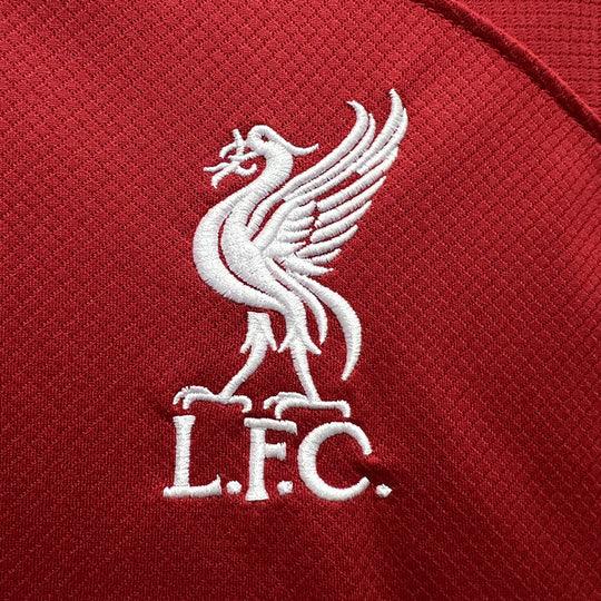 Maillot Liverpool 2023-2024 à manches longues, marque Le 12 -ème Maillot, vue de face avec logo et détails du design.