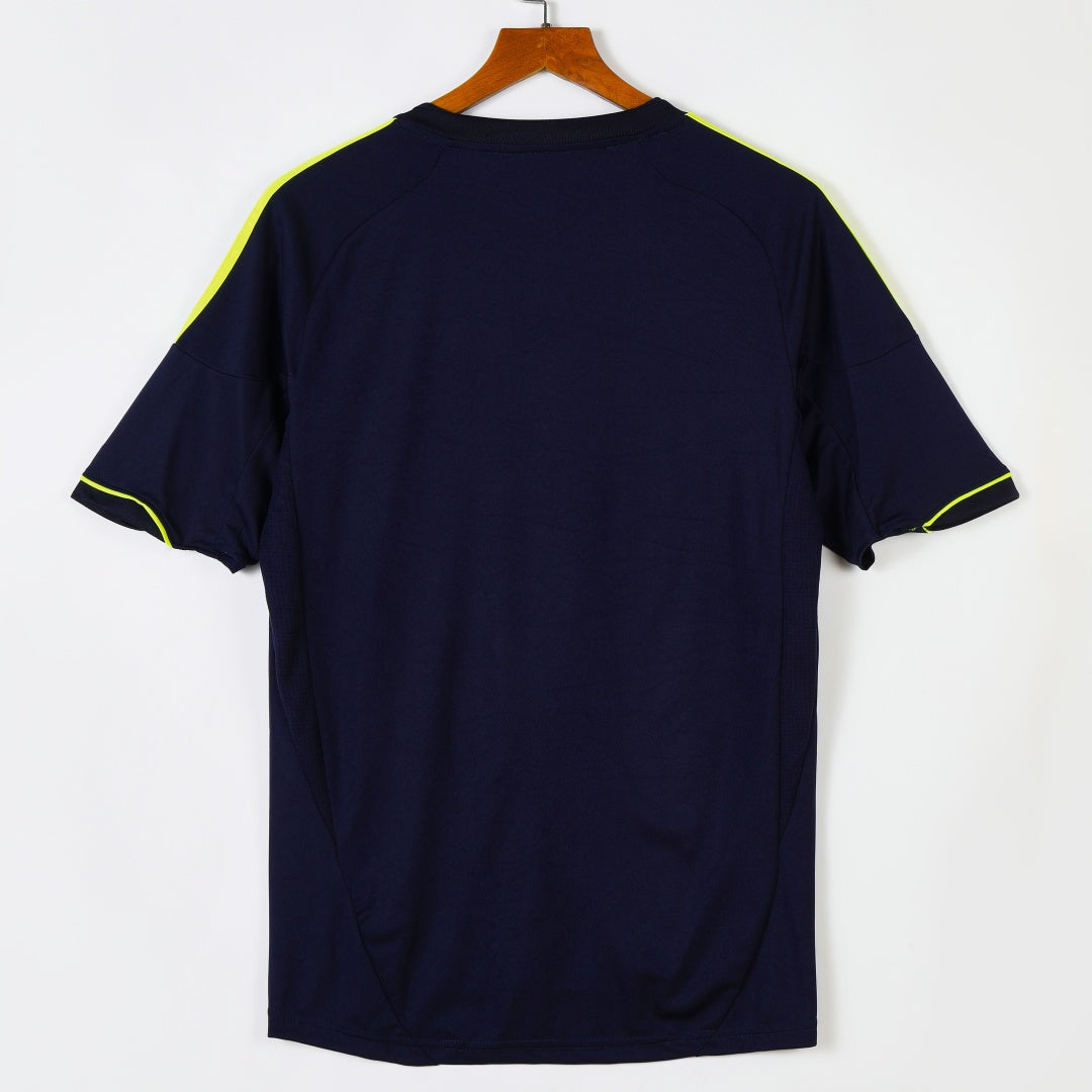 Maillot extérieur rétro du Real Madrid 2012-2013, marque Le 12-ème Maillot, vue de face avec logo et détails du maillot.